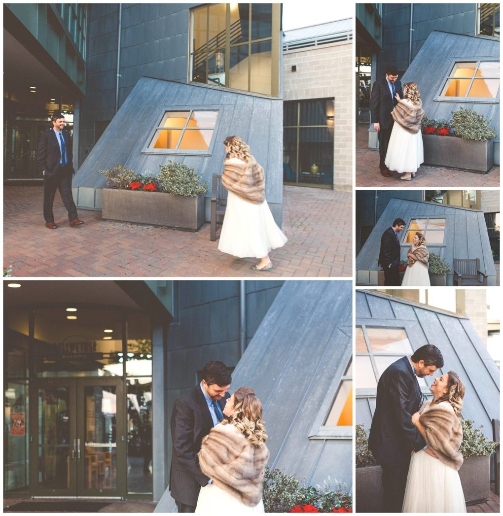Premier snohomish & seattle wedding photographer | gsquared weddings photography a bride in a white dress and fur shawl approaches her groom in a dark suit outside a modern building they share a loving moment smile and embrace in front of a tilted windowcapturing the romance of their snohomish seattle wedding | serving snohomish seattle                   & beyond