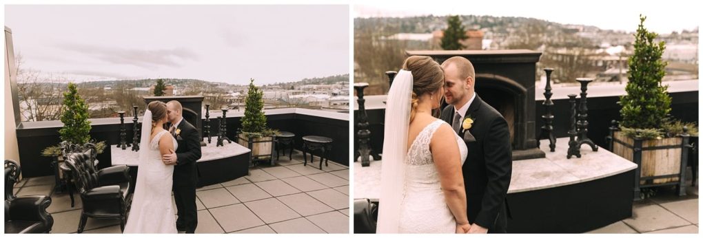 Premier snohomish & seattle wedding photographer | gsquared weddings photography a bride and groom embrace and share a quiet moment on an outdoor patio with city views greenery and black chairs both dressed in wedding attire under an overcast sky at their snohomish seattle wedding | serving snohomish seattle                   & beyond