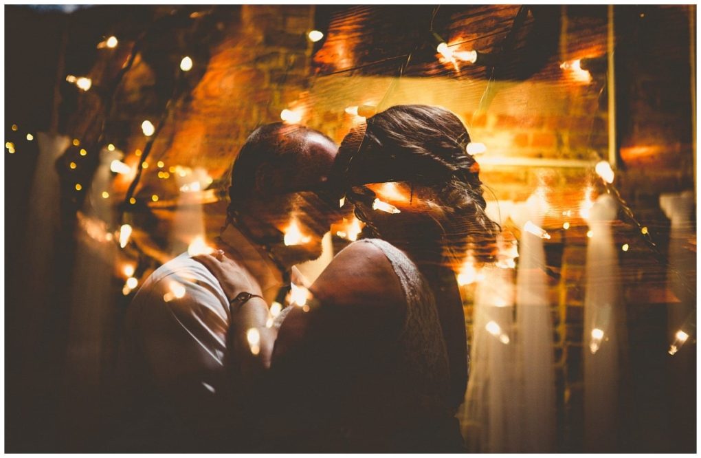 Premier snohomish & seattle wedding photographer | gsquared weddings photography a couple embraces closely their faces touching surrounded by warm glowing string lights in a dimly lit setting creating a romantic and dreamy snohomish seattle wedding engagement atmosphere | serving snohomish seattle & beyond Premier snohomish & seattle wedding photographer | gsquared weddings photography a couple embraces closely their faces touching surrounded by warm glowing string lights in a dimly lit setting creating a romantic and dreamy snohomish seattle wedding engagement atmosphere | serving snohomish seattle & beyond