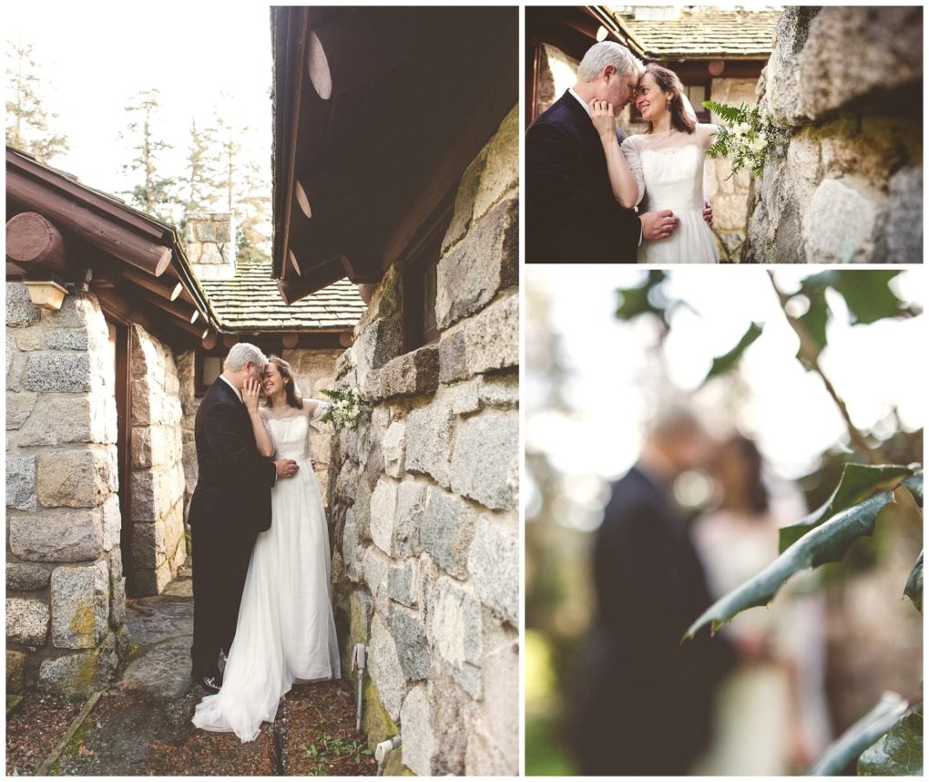 Premier snohomish & seattle wedding photographer | gsquared weddings photography a snohomish bride and groom share intimate joyful moments outside rustic stone walls one photo highlights the couple through a foreground of blurred greenery capturing their seattle wedding engagement | serving snohomish seattle                   & beyond