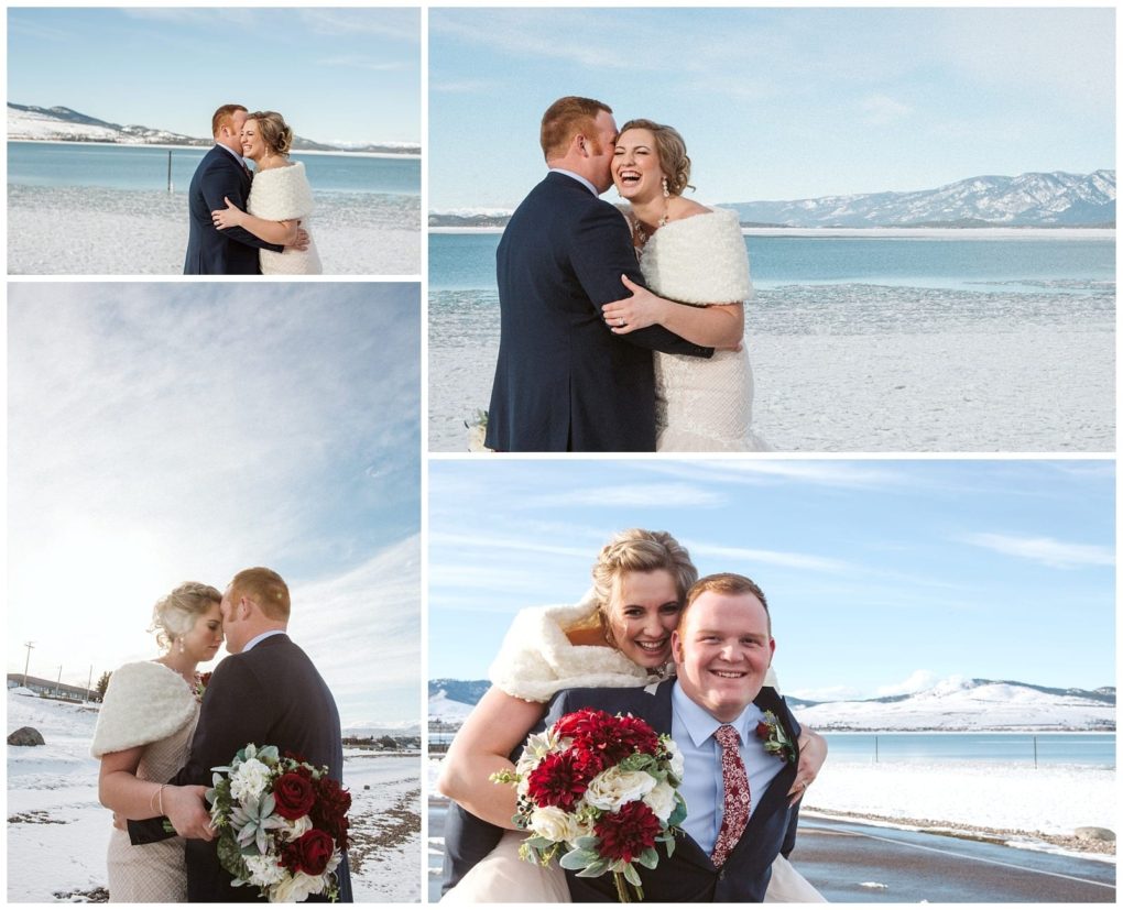 Premier snohomish & seattle wedding photographer | gsquared weddings photography a bride and groom pose and embrace by a snowy lakeside with mountains in the background holding red and white flowers and laughing together on their winter snohomish wedding day | serving snohomish seattle                   & beyond