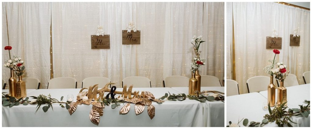 Premier snohomish & seattle wedding photographer | gsquared weddings photography a white table with gold vases holding flowers green and gold leaf garlands and a mr & mrs Sign set against white curtains with fairy lights and wooden his and hers plaquesperfect for a snohomish seattle wedding engagement | serving snohomish seattle                   & beyond
