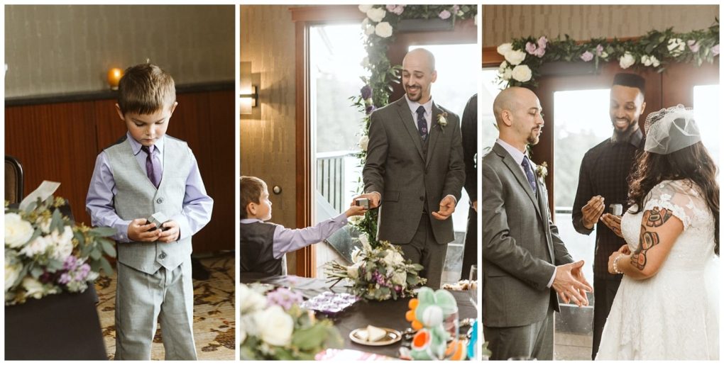 Premier snohomish & seattle wedding photographer | gsquared weddings photography at a snohomish wedding ceremony a young boy in a suit holds the rings before handing them to a man in gray The couple then exchanges rings beneath a floral arch capturing a magical seattle engagement moment | serving snohomish seattle                   & beyond