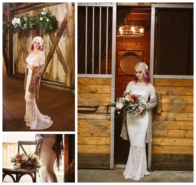 Premier snohomish & seattle wedding photographer | gsquared weddings photography a woman in a lace wedding dress with pink hair poses in a rustic snohomish barn She holds a bouquet of flowers wears a brown shawl and is surrounded by wooden doors and floral decorations for her seattle wedding engagement | serving snohomish seattle                   & beyond