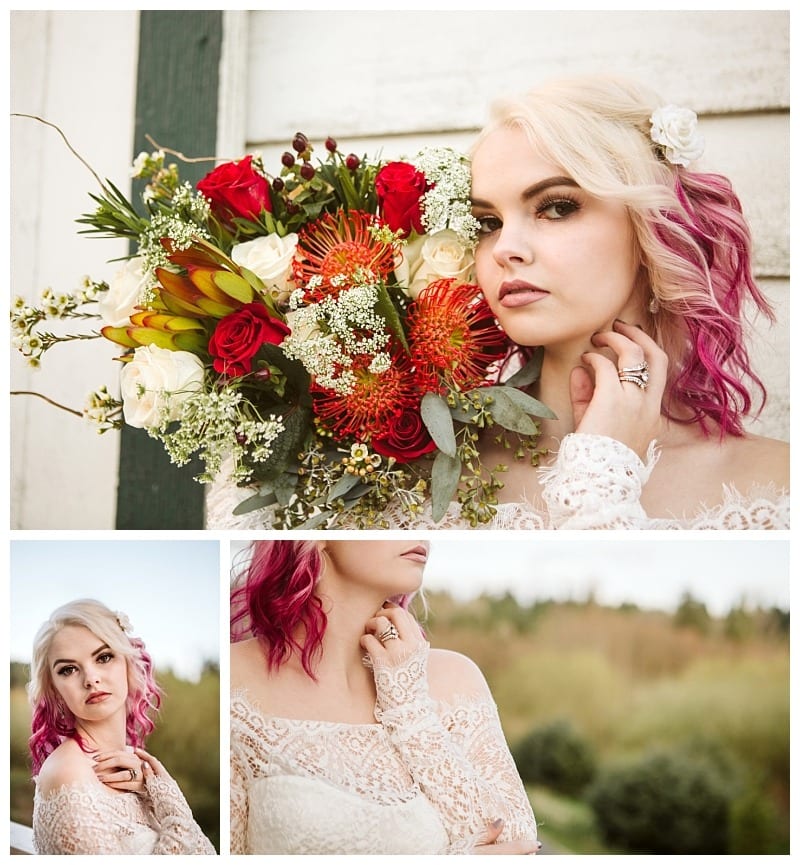 Premier snohomish & seattle wedding photographer | gsquared weddings photography a bride with wavy blonde and pink hair wearing an off shoulder lace dress and a white flower in her hair poses with a bouquet of red orange and white flowers during a romantic outdoor snohomish seattle wedding | serving snohomish seattle                   & beyond