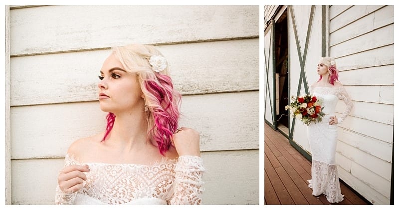Premier snohomish & seattle wedding photographer | gsquared weddings photography a bride with blonde and pink hair wearing an off the shoulder lace gown and a flower hair accessory stands by a white wooden wall holding a bouquet outside a rustic snohomish building for her seattle wedding engagement | serving snohomish seattle                   & beyond