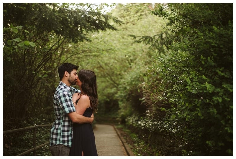 Premier snohomish & seattle wedding photographer | gsquared weddings photography a couple embraces closely on a tree lined path near snohomish surrounded by lush green foliage Sharing an intimate moment they stand facing each otherperfect for a seattle wedding engagement portrait | serving snohomish seattle                   & beyond