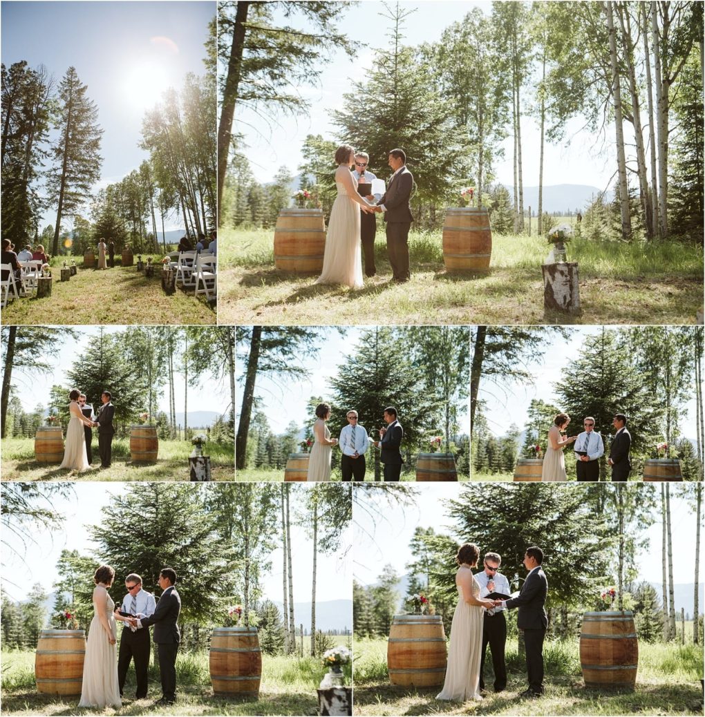 Premier snohomish & seattle wedding photographer | gsquared weddings photography an outdoor snohomish wedding ceremony in a forested area on a sunny day with a bride and groom exchanging vows in front of an officiant surrounded by trees guests seated on white chairs and wooden barrels with flower arrangements | serving snohomish seattle                   & beyond