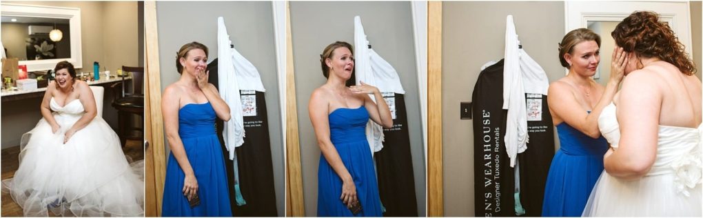 Premier snohomish & seattle wedding photographer | gsquared weddings photography in a snohomish dressing room before the wedding a bride in white and her bridesmaid in blue share an emotional moment wiping away tears and comforting each other before the seattle celebration | serving snohomish seattle                   & beyond