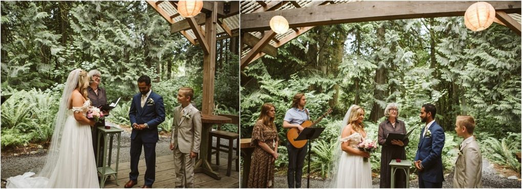 Premier snohomish & seattle wedding photographer | gsquared weddings photography a bride and groom stand with two children and an officiant under a wooden pergola in a lush forested snohomish setting In one photo two women play guitar and sing while the seattle wedding ceremony takes place | serving snohomish seattle                   & beyond