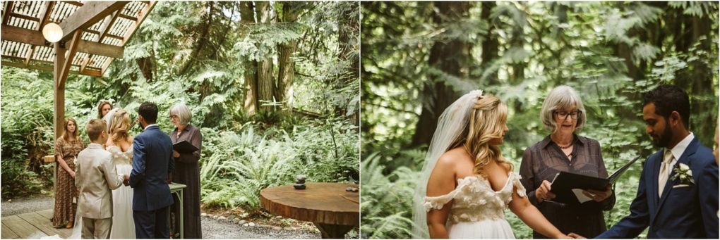 Premier snohomish & seattle wedding photographer | gsquared weddings photography a small snohomish wedding ceremony unfolds in a lush forest setting near seattle A couple stands before an officiant exchanging vows as a few guests watch surrounded by tall green ferns and trees under a wooden canopy | serving snohomish seattle                   & beyond