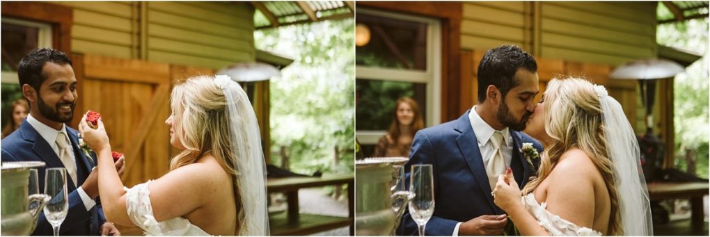 Premier snohomish & seattle wedding photographer | gsquared weddings photography a bride and groom stand together outdoors at their snohomish wedding In the first image the bride holds a piece of cake toward the groom as they smile In the second they kiss holding cake pieces A blurred guest stands in the background | serving snohomish seattle                   & beyond
