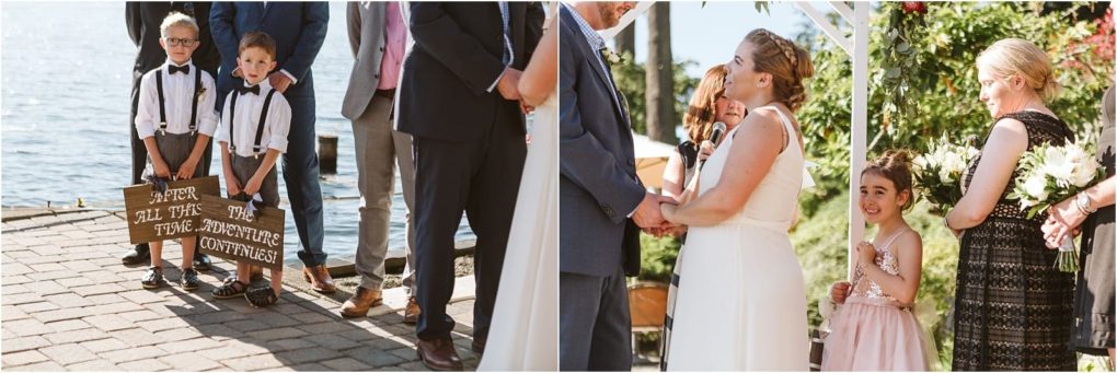 Premier snohomish & seattle wedding photographer | gsquared weddings photography a snohomish wedding ceremony by the water two boys in suspenders hold signs the bride and groom exchange vows and a flower girl and bridesmaid stand nearby all smiling under sunny seattle skies | serving snohomish seattle                   & beyond