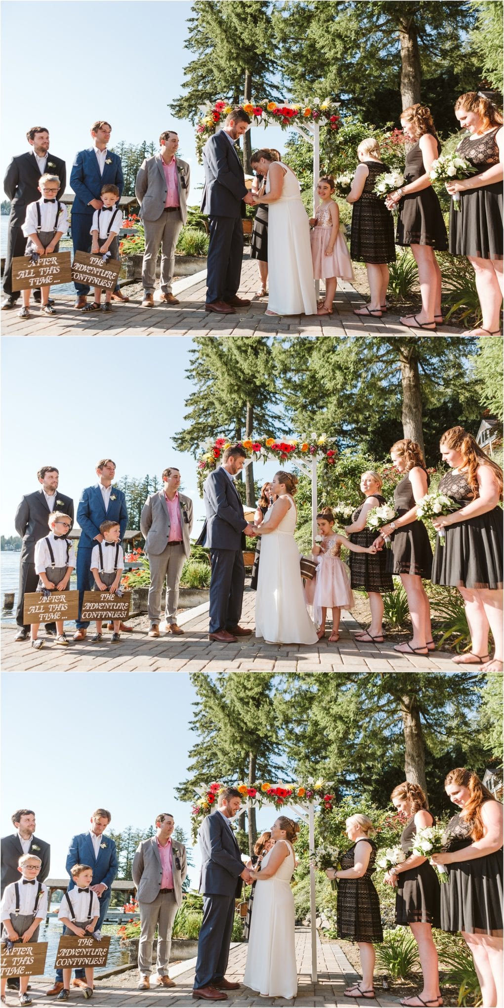 Premier snohomish & seattle wedding photographer | gsquared weddings photography a bride and groom stand under a floral arch during a joyful outdoor wedding ceremony by a lake in snohomish near seattle surrounded by bridesmaids groomsmen and two children holding signs | serving snohomish seattle                   & beyond