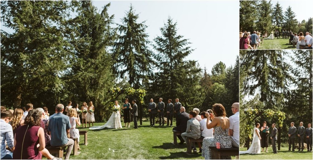 Premier snohomish & seattle wedding photographer | gsquared weddings photography an outdoor snohomish wedding ceremony with rows of seated guests facing a bride groom and wedding party under a floral arch surrounded by tall evergreen trees on a sunny seattle day | serving snohomish seattle                   & beyond