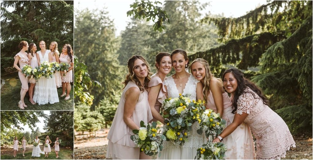 Premier snohomish & seattle wedding photographer | gsquared weddings photography a bride in a white dress and her four bridesmaids in light pink dresses stand closely together outdoors during a sunny snohomish seattle wedding smiling and holding large bouquets with yellow flowers surrounded by trees | serving snohomish seattle                   & beyond