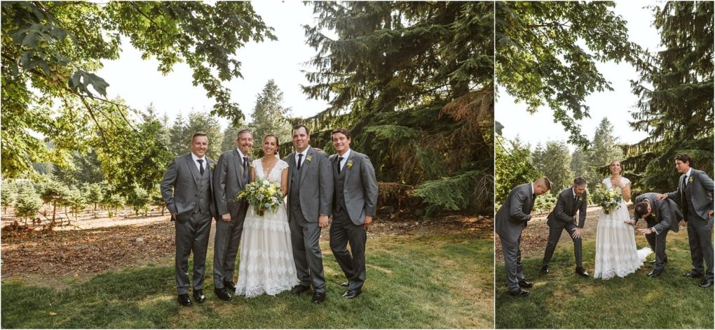 Premier snohomish & seattle wedding photographer | gsquared weddings photography a bride in a white dress stands outdoors with four men in gray suits posing for photos during a snohomish seattle wedding In the second photo everyone laughs as two groomsmen adjust the brides dress Tall trees create a beautiful backdrop | serving snohomish seattle                   & beyond