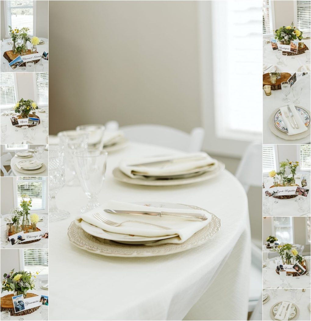 Premier snohomish & seattle wedding photographer | gsquared weddings photography a white clothed dining table set with stacked plates silverware and glasses Centerpieces with flowers and travel themed place cards are visible perfect for a snohomish or seattle wedding engagement with natural light streaming through nearby windows | serving snohomish seattle                   & beyond