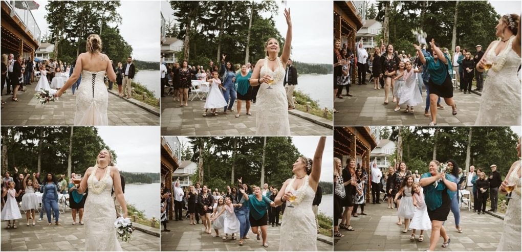 Premier snohomish & seattle wedding photographer | gsquared weddings photography a bride in a white dress tosses her bouquet to a group of excited women and girls outdoors at a snohomish seattle wedding They reach up laughing and cheering with trees and water visible in the background | serving snohomish seattle                   & beyond