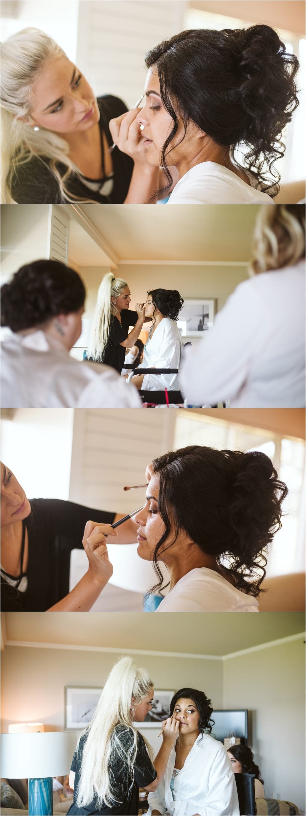 Premier snohomish & seattle wedding photographer | gsquared weddings photography a makeup artist with long blonde hair applies makeup to a woman with dark hair styled in an updo Indoors the woman in a white robe is preparing for her snohomish or seattle wedding or engagement | serving snohomish seattle                   & beyond