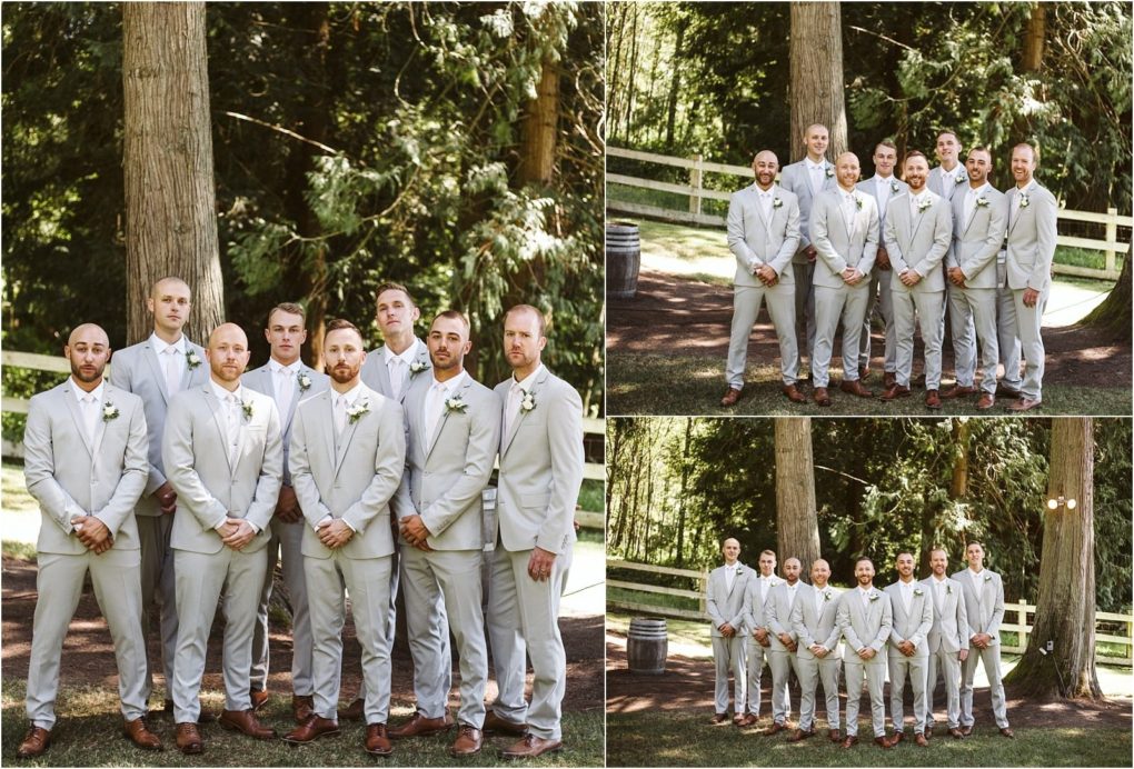 Premier snohomish & seattle wedding photographer | gsquared weddings photography a group of groomsmen in light gray suits with white shirts and brown shoes pose together outdoors in a wooded area near snohomish standing on grass by trees and a white fenceperfect for a seattle wedding or engagement | serving snohomish seattle                   & beyond