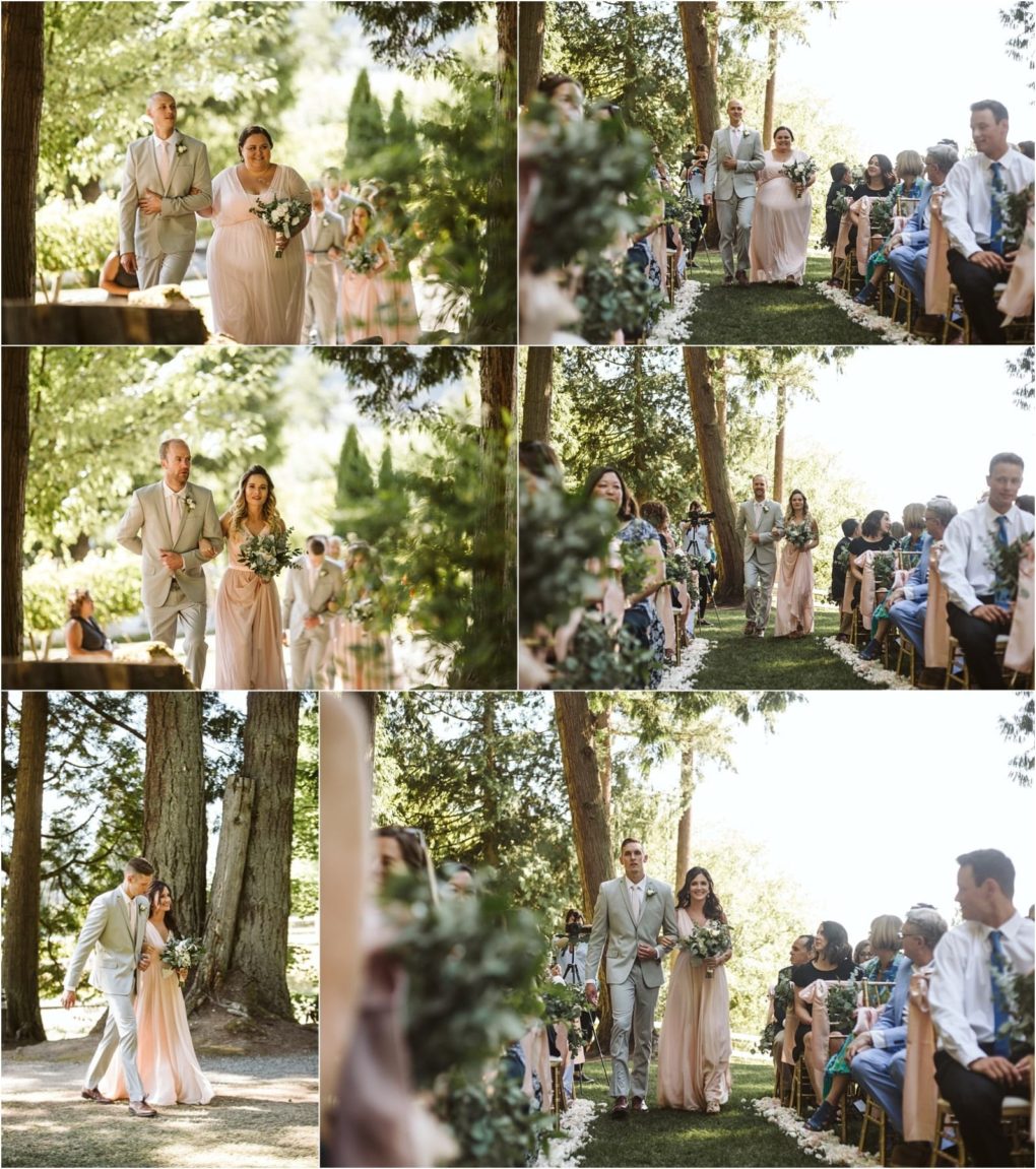 Premier snohomish & seattle wedding photographer | gsquared weddings photography wedding party members dressed in light attire walk down an outdoor aisle lined with guests and greenery on a sunny day surrounded by trees and natural light at a romantic snohomish seattle wedding | serving snohomish seattle                   & beyond