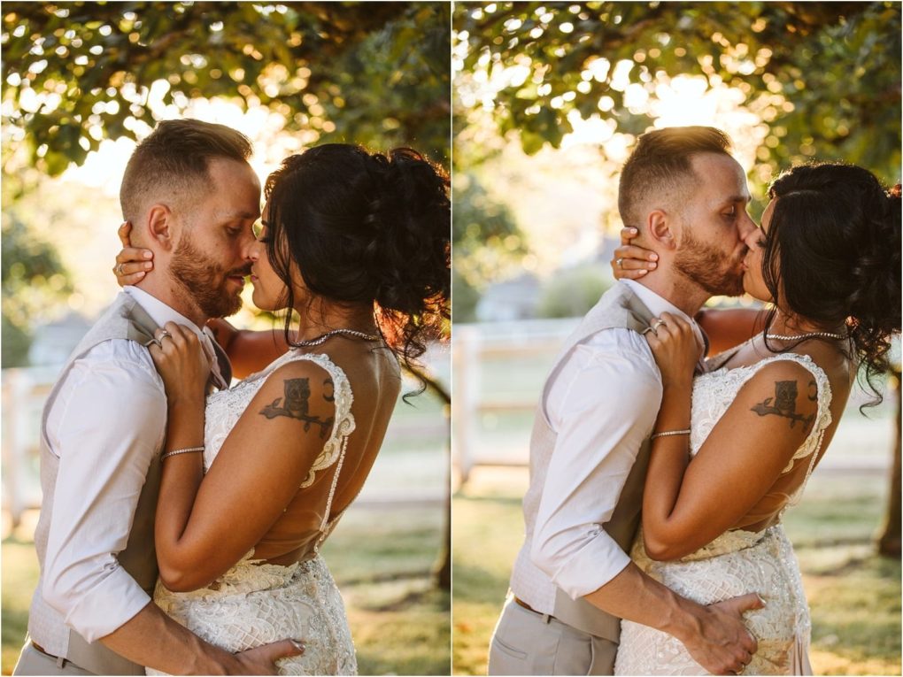 Premier snohomish & seattle wedding photographer | gsquared weddings photography a bride and groom embrace and kiss outdoors at sunset under a tree in this warm romantic snohomish wedding scene The bride wears a lacy white dress while the groom sports a beard with a white shirt and suspenders | serving snohomish seattle                   & beyond