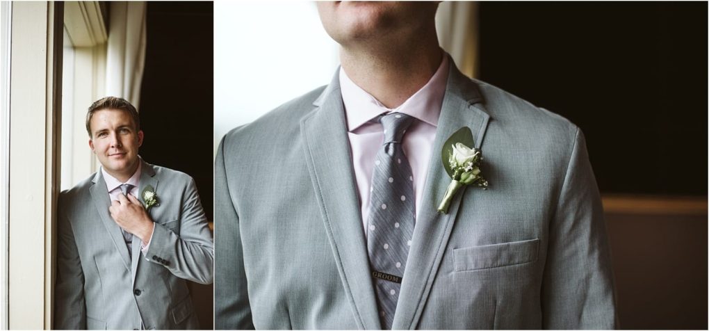 Premier snohomish & seattle wedding photographer | gsquared weddings photography a man in a light gray suit with a white boutonniere stands by a window adjusting his tiecapturing the anticipation of a snohomish seattle wedding The right side shows a close up of his suit tie and boutonniere against a dark background | serving snohomish seattle                   & beyond