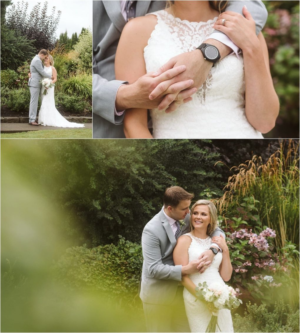 Premier snohomish & seattle wedding photographer | gsquared weddings photography a bride and groom in a lush snohomish garden embrace and smile at each other The bride holds a bouquet the groom stands behind her in a light gray suit Close up shows their hands gently clasped surrounded by vibrant flowers | serving snohomish seattle                   & beyond