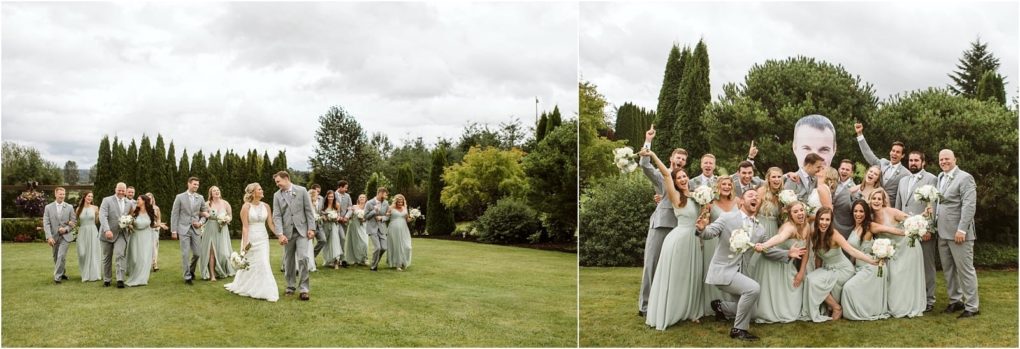 Premier snohomish & seattle wedding photographer | gsquared weddings photography a snohomish wedding party in matching light gray and green attire walks on a lawn left then gathers cheerfully some holding bouquets and a large cutout face posing together with trees in the background right | serving snohomish seattle                   & beyond
