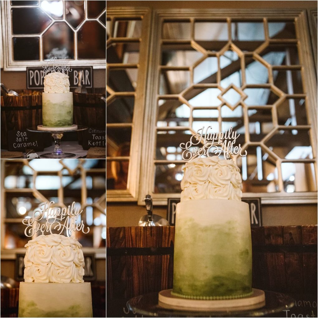 Premier snohomish & seattle wedding photographer | gsquared weddings photography a two tiered green and white ombre cake with white rose decorations and a happily ever after topper displayed on a cake stand in front of mirrors at a snohomish seattle wedding dessert or popcorn bar | serving snohomish seattle                   & beyond