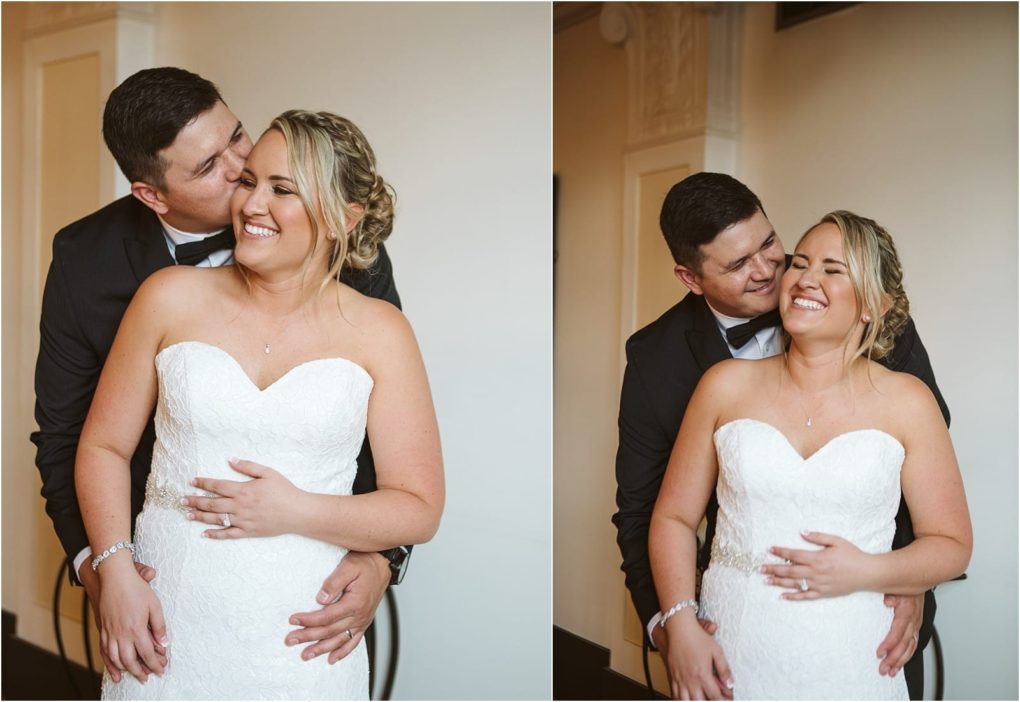 Premier snohomish & seattle wedding photographer | gsquared weddings photography a groom in a black tuxedo embraces a smiling bride in a strapless white dress Both appear joyful and laughing celebrating their love at this unforgettable snohomish seattle wedding against a neutral indoor background | serving snohomish seattle                   & beyond