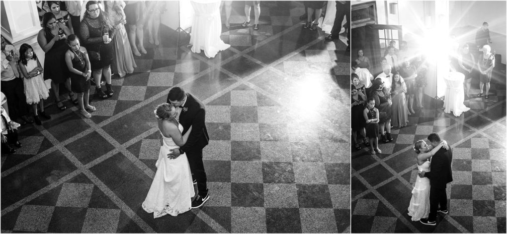 Premier snohomish & seattle wedding photographer | gsquared weddings photography a bride and groom share their first dance in the center of a checkered floor at a stunning snohomish seattle wedding surrounded by guests watching from the edges The scene is lit dramatically with a bright light source in the background | serving snohomish seattle                   & beyond
