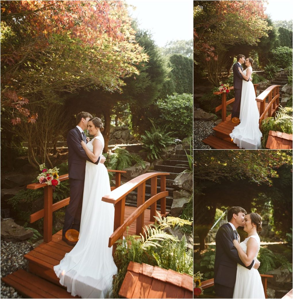 Premier snohomish & seattle wedding photographer | gsquared weddings photography a bride and groom embrace and share a kiss on a small wooden bridge in a lush garden surrounded by greenery and sunlight in three romantic snohomish wedding photos | serving snohomish seattle                   & beyond