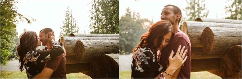 Premier snohomish & seattle wedding photographer | gsquared weddings photography two photos side by side show a couple outdoors by large stacked logs embracing closely and sharing an intimate moment surrounded by treesa perfect snohomish seattle engagement with the woman resting her head on the mans chest as they smile gently | serving snohomish seattle                   & beyond