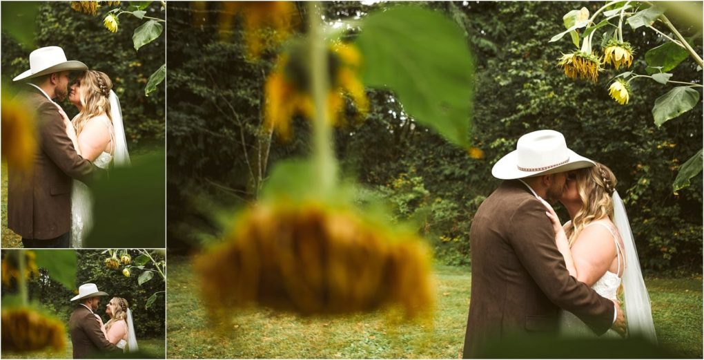 Premier snohomish & seattle wedding photographer | gsquared weddings photography a bride and groom embrace and kiss outdoors in a lush snohomish setting surrounded by greenery and sunflowers yellow petals blurred in the foreground The groom wears a white hat the bride wears a white dressperfect for a seattle wedding engagement | serving snohomish seattle                   & beyond