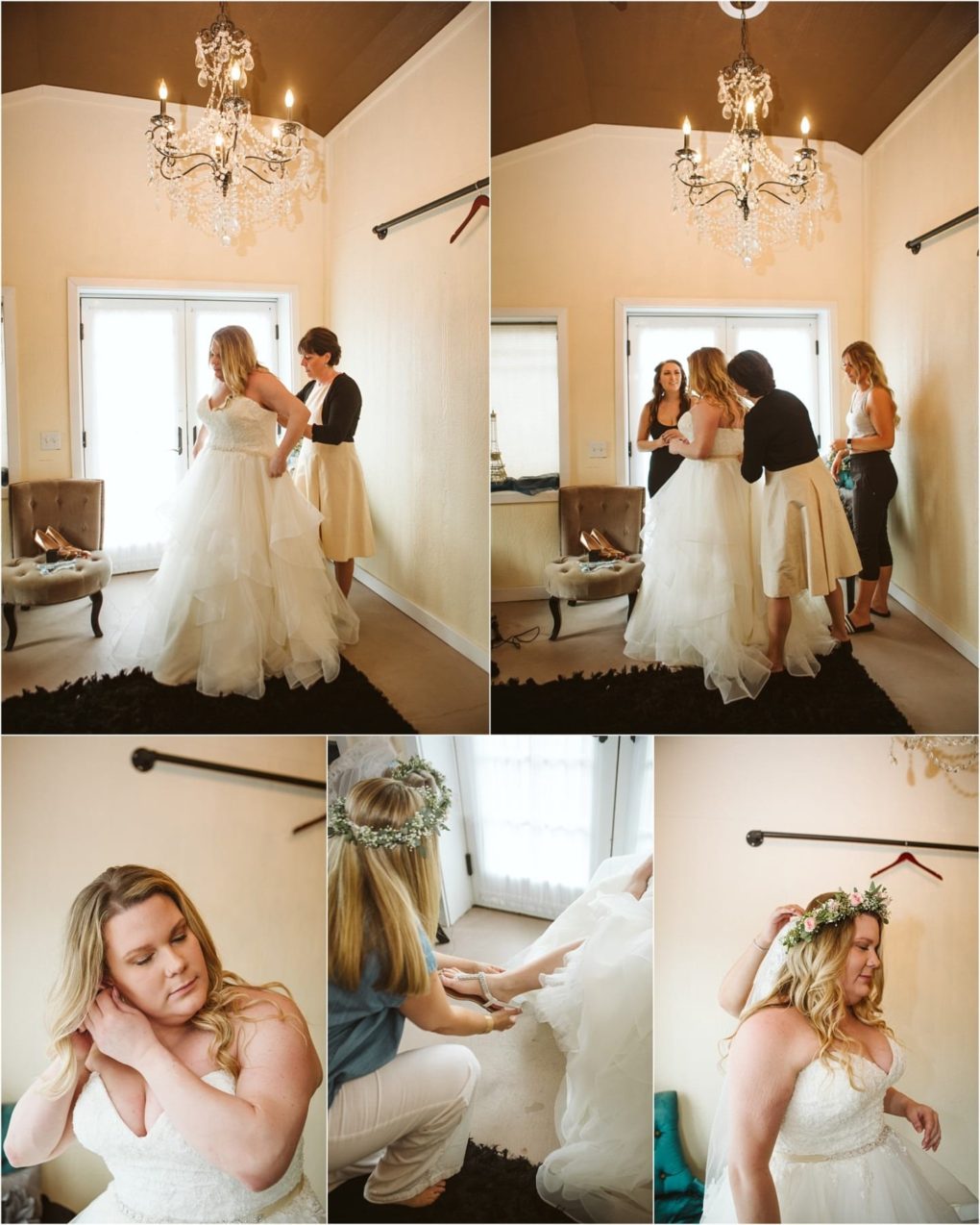 Premier snohomish & seattle wedding photographer | gsquared weddings photography a bride in a white gown gets ready with her bridesmaids in a softly lit room with chandeliers before her snohomish seattle wedding They adjust her dress put on shoes and she wears a floral crown while preparing for the big day | serving snohomish seattle                   & beyond