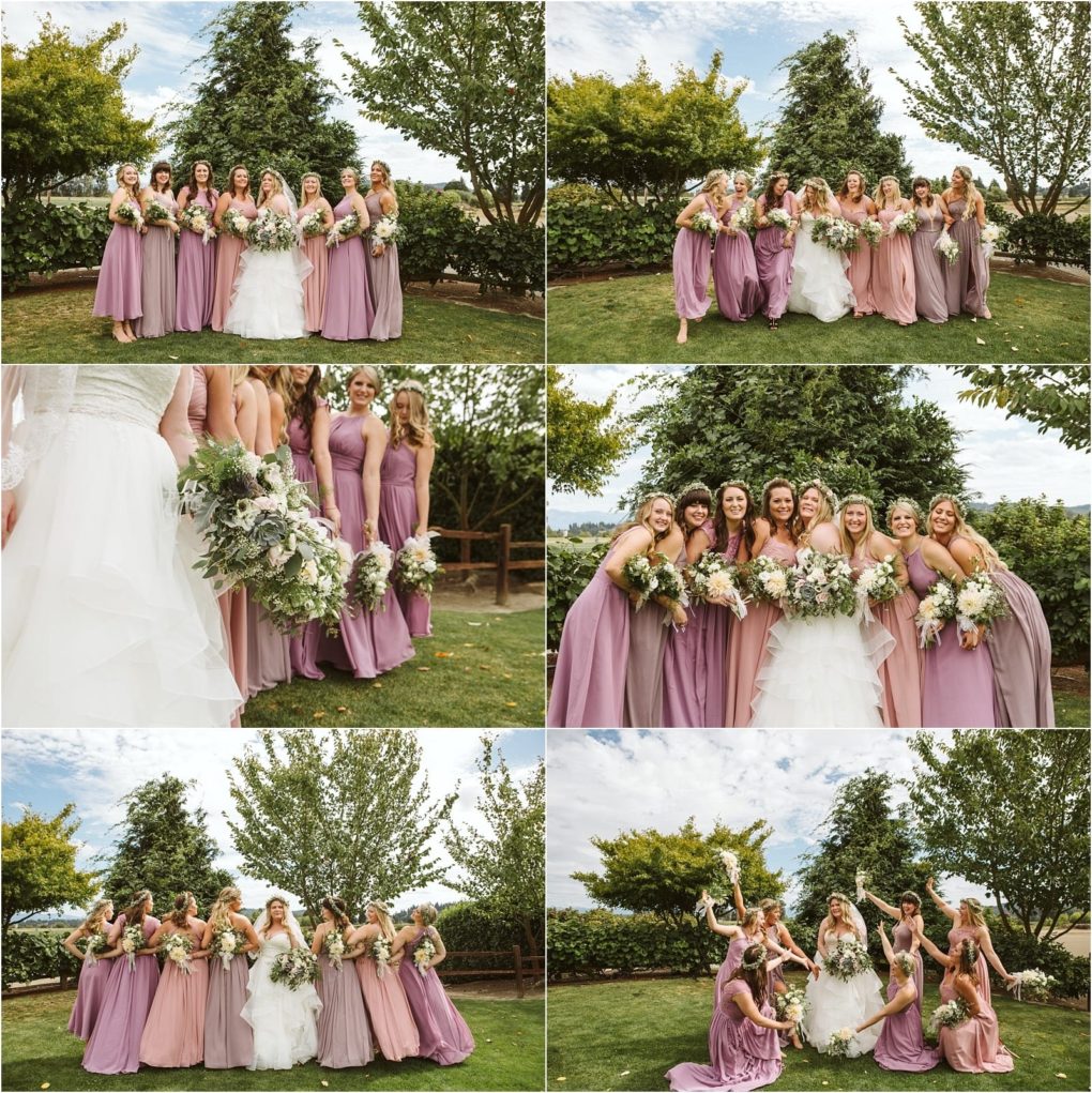 Premier snohomish & seattle wedding photographer | gsquared weddings photography a bride in a white gown poses outdoors with her bridesmaids in lavender dresses holding bouquets and smiling during a snohomish seattle wedding surrounded by greenery and trees under a partly cloudy sky | serving snohomish seattle                   & beyond