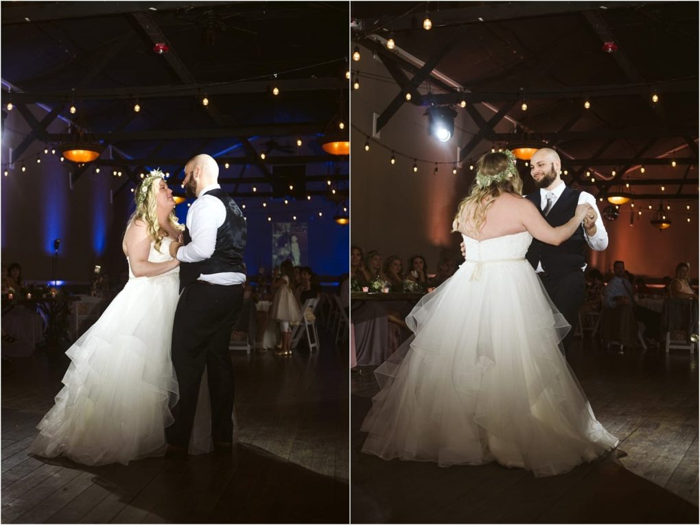 Premier snohomish & seattle wedding photographer | gsquared weddings photography a bride and groom share their first dance in a warmly lit snohomish venue surrounded by guests at tables The bride wears a white gown and floral headpiece the groom wears a vest and tie String lights hang overhead | serving snohomish seattle                   & beyond