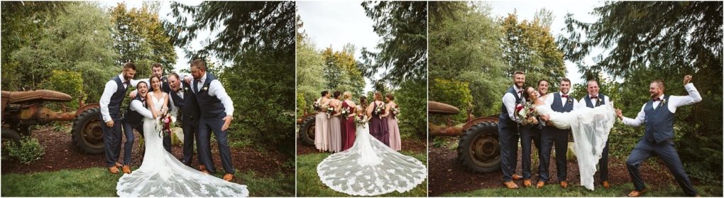 Premier snohomish & seattle wedding photographer | gsquared weddings photography a bride and groom pose playfully with their wedding party outdoors by an old tractor in snohomish surrounded by greenery The brides white dress fans out beautifully on the grass as everyone laughs and smiles at this seattle wedding | serving snohomish seattle                   & beyond