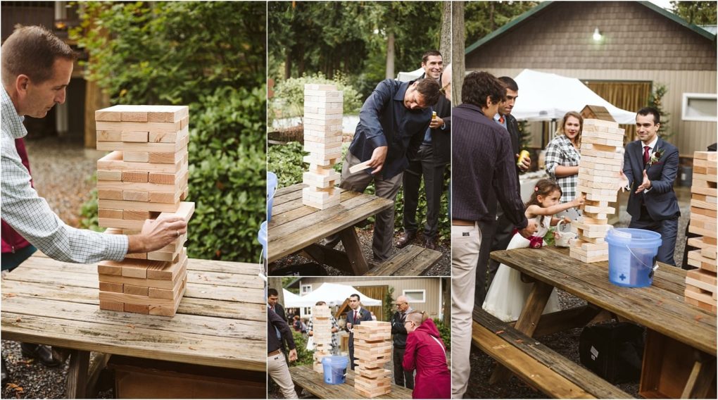 Premier snohomish & seattle wedding photographer | gsquared weddings photography collage of adults and children playing giant jenga outdoors at a picnic table during a casual snohomish gathering or seattle wedding event surrounded by trees and rustic buildings with everyone focused on the game | serving snohomish seattle                   & beyond