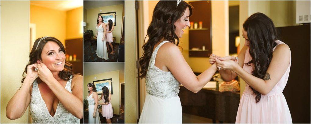 Premier snohomish & seattle wedding photographer | gsquared weddings photography a bride in a white dress and jeweled headband laughs while putting on earrings before her snohomish wedding as a bridesmaid in pink helps her with jewelry in a warmly lit room | serving snohomish seattle                   & beyond