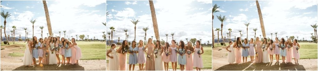 Premier snohomish & seattle wedding photographer | gsquared weddings photography a group of bridesmaids in pastel dresses stand together outdoors on a sunny day at a snohomish seattle wedding holding bouquets with palm trees and a bright sky in the background | serving snohomish seattle                   & beyond