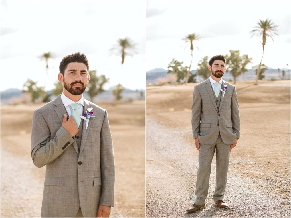 Premier snohomish & seattle wedding photographer | gsquared weddings photography a man in a light gray suit with a boutonnière stands outdoors in a dry desert like landscape reminiscent of snohomish seattle wedding engagement style with palm trees and distant mountains looking serious in close up and full body shots | serving snohomish seattle                   & beyond