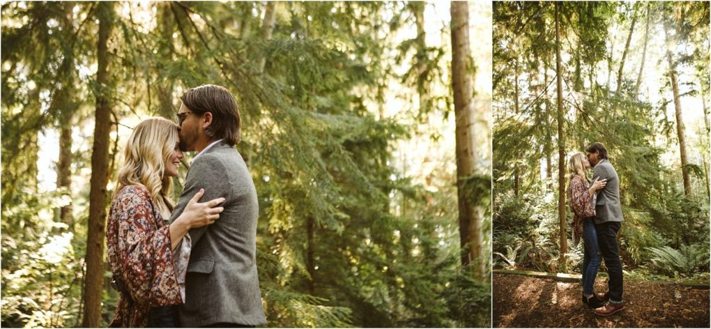 Premier snohomish & seattle wedding photographer | gsquared weddings photography a couple embraces and smiles at each other in a sunlit forest near snohomish surrounded by tall trees and lush greenery They appear happy and close enjoying a quiet engagement moment together in nature | serving snohomish seattle                   & beyond