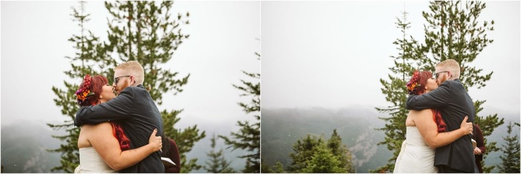 Premier snohomish & seattle wedding photographer | gsquared weddings photography two people in wedding attire embrace and kiss outdoors with tall pine trees and misty mountains in the backgrounda romantic snohomish seattle wedding moment The bride has red hair with flowers the groom wears glasses and a suit | serving snohomish seattle                   & beyond