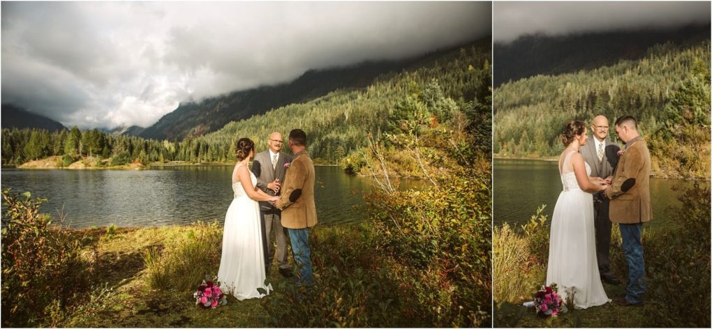 Premier snohomish & seattle wedding photographer | gsquared weddings photography a couple stands by a lake in a forested mountain landscape near snohomish holding hands and exchanging vows with an officiant The bride wears a white dress the groom a brown jacket and their bouquet rests nearbyan intimate seattle wedding scene | serving snohomish seattle                   & beyond