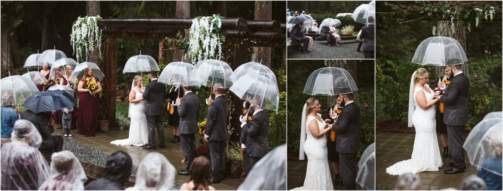Premier snohomish & seattle wedding photographer | gsquared weddings photography a rainy snohomish outdoor wedding ceremony the bride groom and guests hold clear umbrellas among trees and flowers while the couple exchanges vows under a wooden arch in classic seattle wedding style | serving snohomish seattle                   & beyond