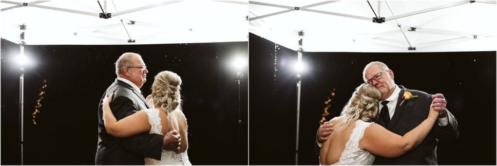Premier snohomish & seattle wedding photographer | gsquared weddings photography a bride in a white dress shares a dance with an older man in a suit and tie under a white tent at night illuminated by bright lights at their unforgettable snohomish seattle wedding | serving snohomish seattle                   & beyond