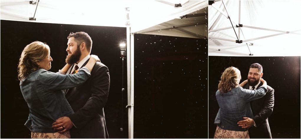 Premier snohomish & seattle wedding photographer | gsquared weddings photography a man in a suit and a woman in a denim jacket dance together under a white tent at night during a snohomish wedding with soft lighting illuminating them and light rain falling around | serving snohomish seattle                   & beyond